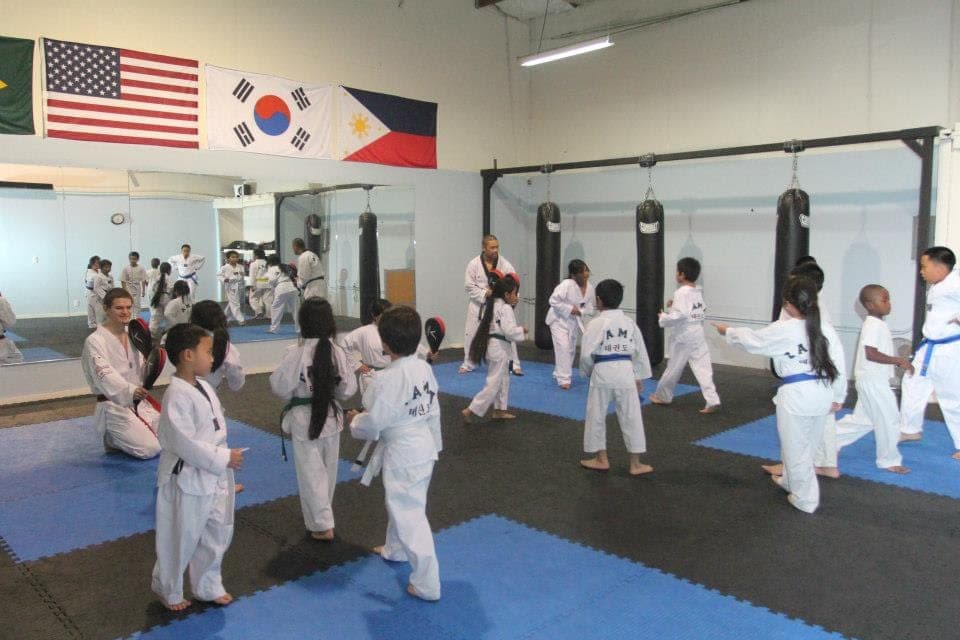 Taekwondo class training inside the original San Juan Avenue garage