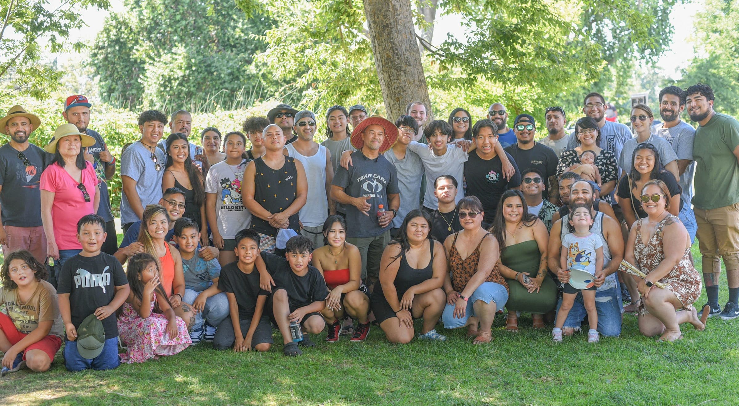 Team Cama community gathering at the park