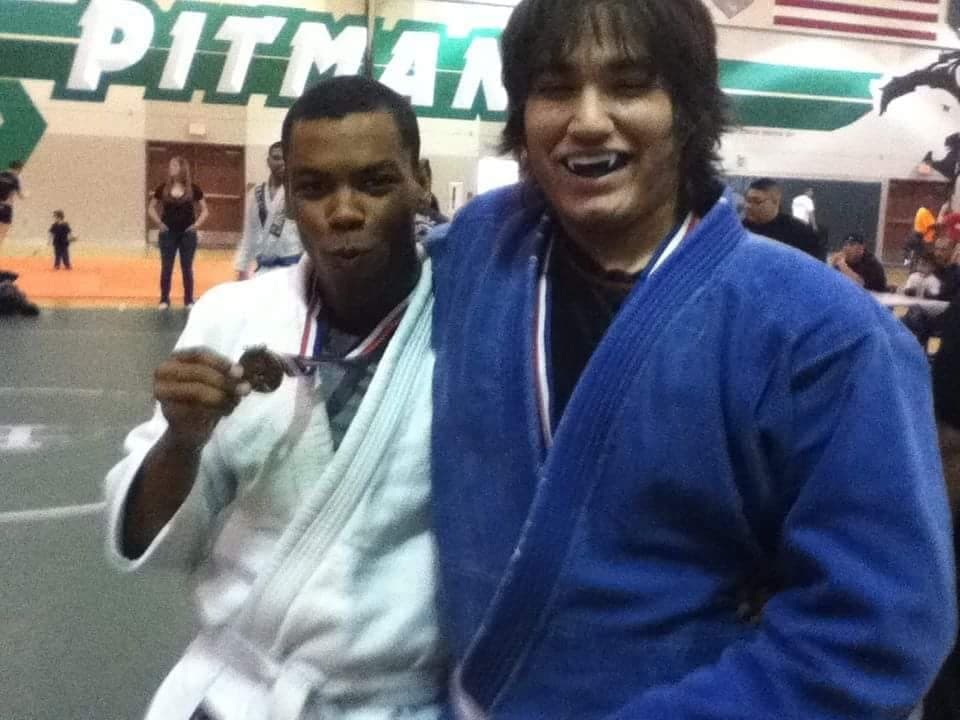 Isaiah Ferguson and Angelo Garcia at a Jiu-Jitsu tournament