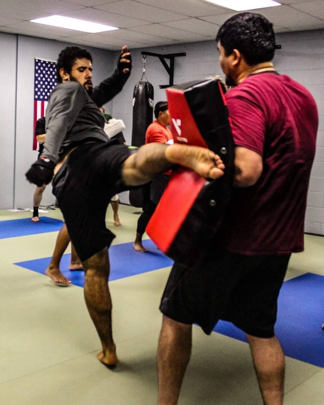 Christian Orellana drilling kicks on the pads